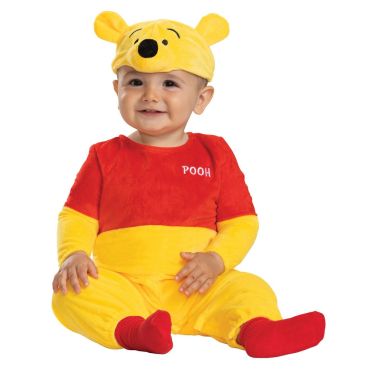 Bébé portant une robe de princesse jaune inspirée de Belle, avec tulle, nœuds roses et détails dorés.