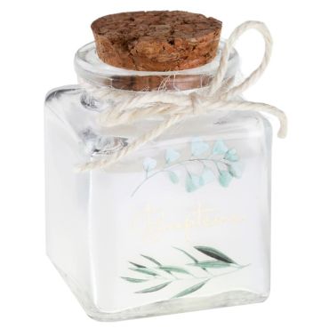 Une jolie petite bougie dans un contenant en verre pour la table de réception du baptême de votre enfant | jourdefete.com