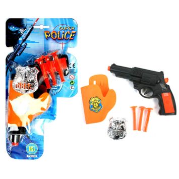 Pistolet de policier et son badge