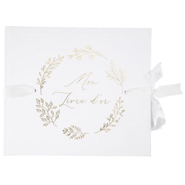 Un livre d'or blanc aux motifs dorés pour la première communion de votre enfant | jourdefete.com Un livre d'or blanc aux motifs dorés pour la première communion de votre enfant | jourdefete.com